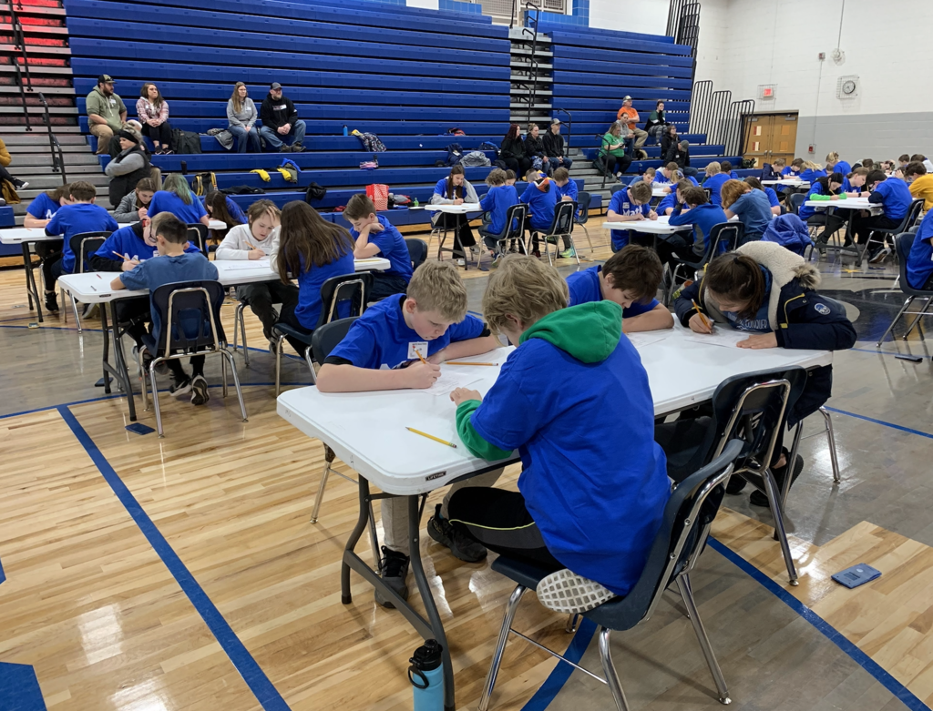 Today 16 sixth graders spent the morning at the St. Croix Central Middle School competing in a math masters competition. This competition challenges students to use critical thinking and problem solving skills in mathematics.  The day consisted of taking 8 tests, fact fluency, 4 individual rounds, and 3 team rounds.  Overall the 6th graders did great with Ben Helseth taking home a 15th place ribbon in the fact fluency portion.  During the Individual tests earning ribbons were, August Benoy 10th, Melanie Seeger 9th, Mackenzie Hince , and Ben Helseth medaling in 4th.  In the team round our teams placed 8th, 5th, and 2nd overall out of 15 teams.  Our second place team of Mackenzie Hince, Joey Knothe, August Benoy, Konrad Theis, and Luke Lundstrom earned Medals and a plaque for the school.  Congratulations to all of the teams!